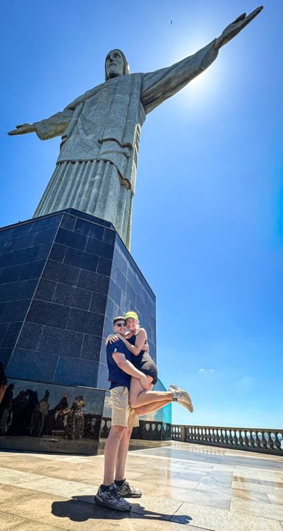Stefano lifting Jenna under Christ the Redeemer