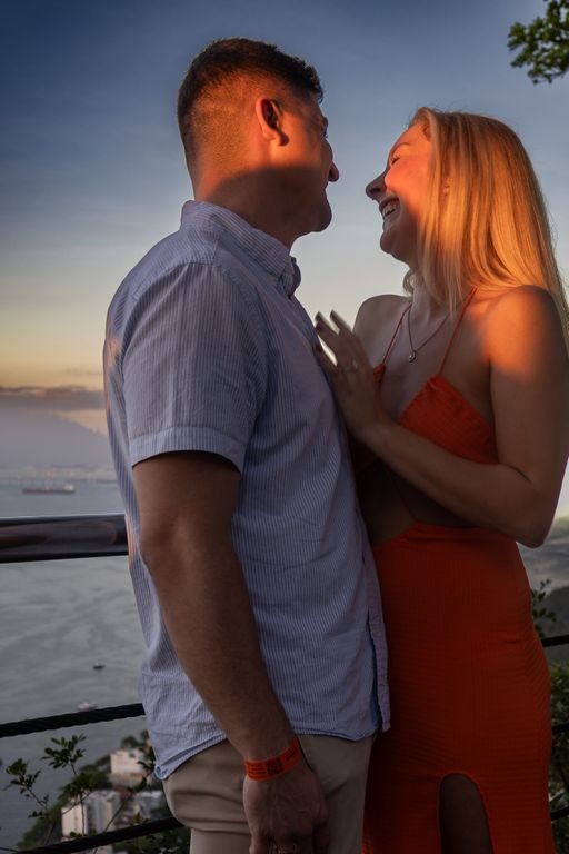 Smiling at each other at sunset
